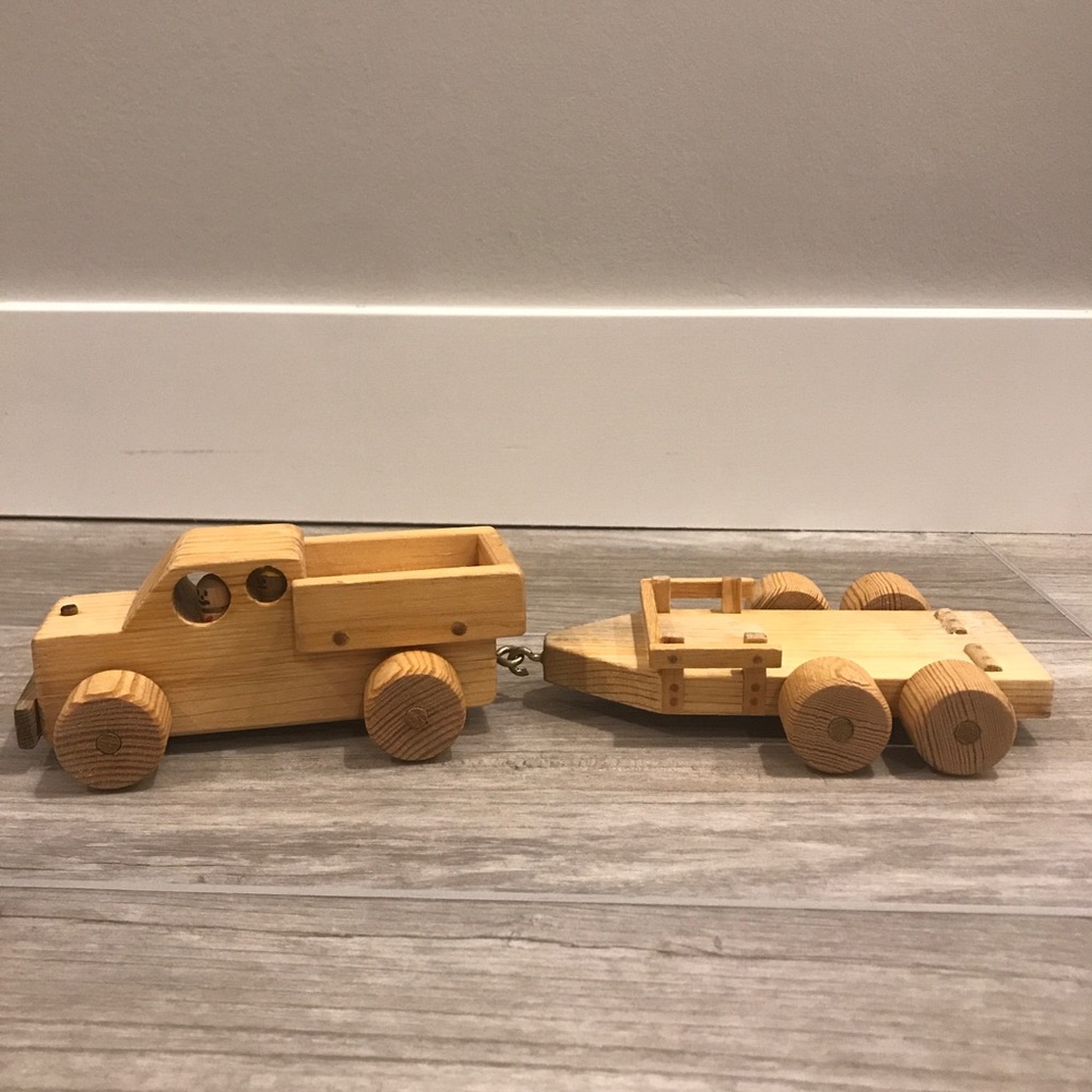 Vintage wooden farm truck and trailer toy.